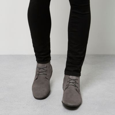 Grey suede lace-up boots
